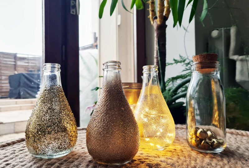 DIY festif : recycler des bouteilles en verre pour décorer la table des fêtes